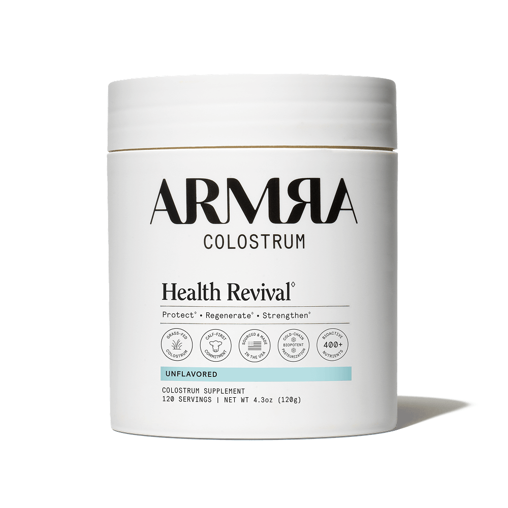 ARMRA Colostrum supplement container on a black background