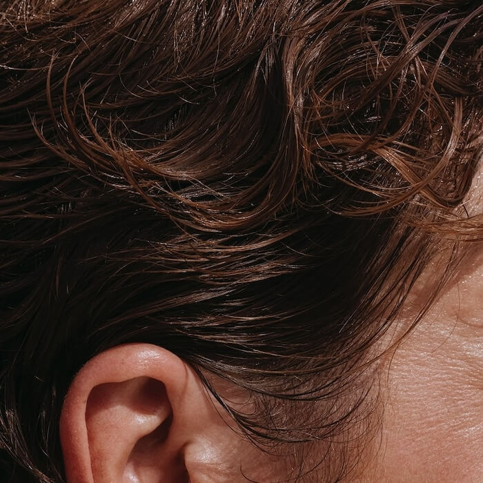 Detail shot of a man's wavy hair