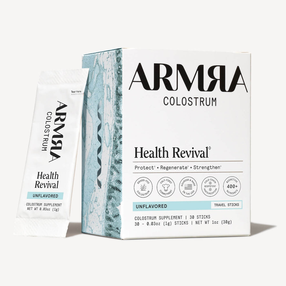 ARMRA Colostrum unflavored travel sticks box with 30 individual packets displayed next to packaging.