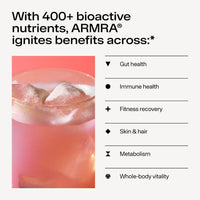 Glass of pink watermelon-colored beverage with ice cubes and product benefit text listed on right.