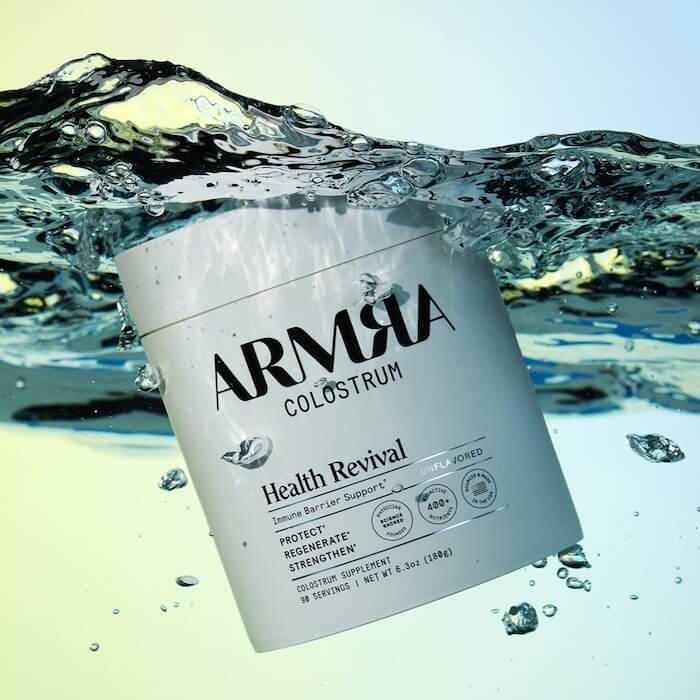A jar of ARMRA colostrum underwater