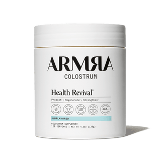 ARMRA Colostrum supplement container on a black background