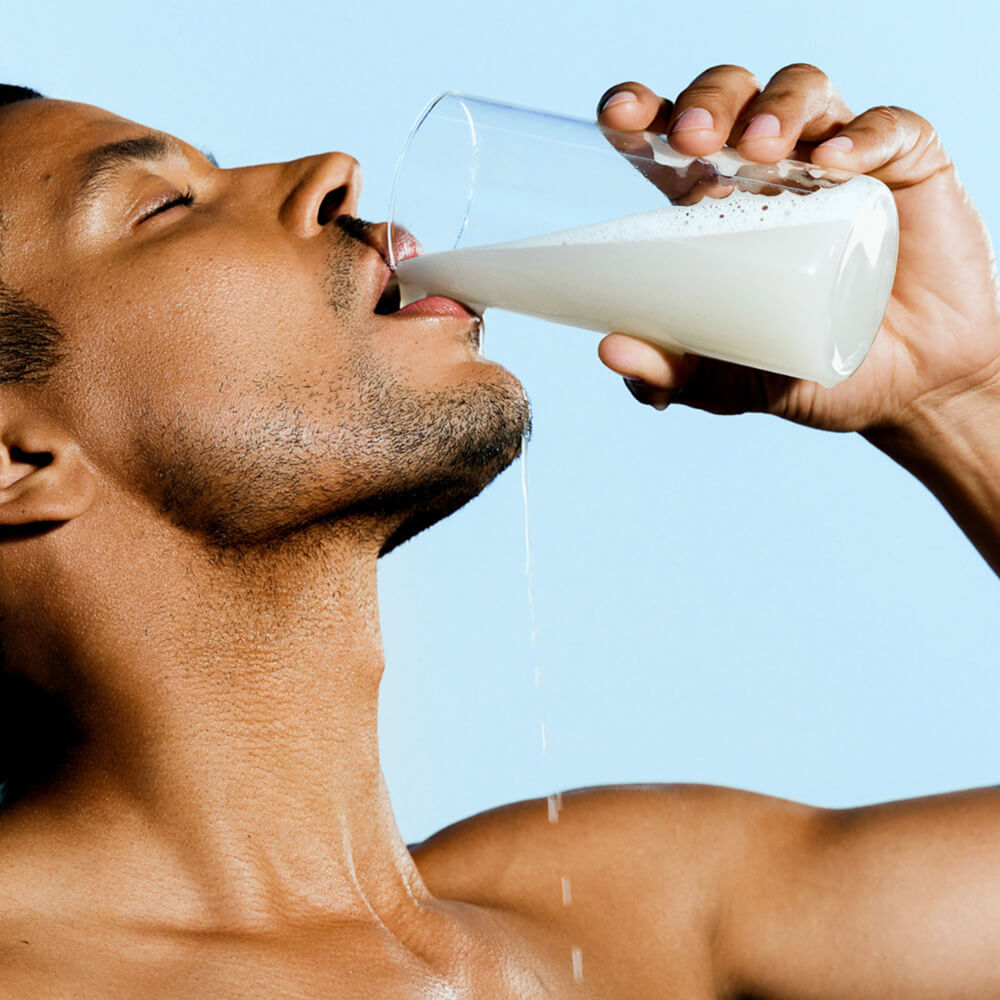 A man drinking ARMRA colostrum