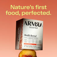 ARMRA Colostrum Peach Persimmon Travel Sticks box with 38 individual sticks displayed against coral background with peach fru