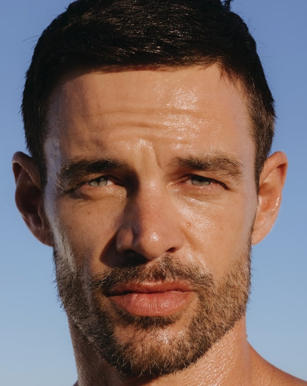 A man's face lit by the sun