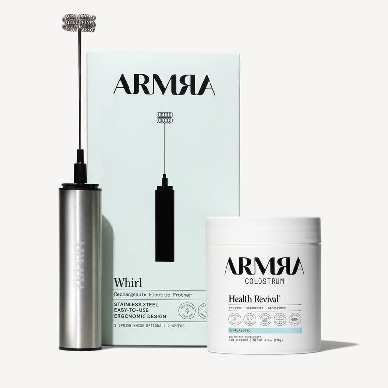ARMRA Colostrum Revitalizer Set with stainless steel electric frother, instruction card, and Health Revival powder container.