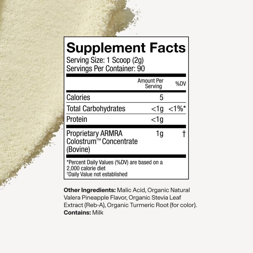 Supplement facts label with protein powder in the background
