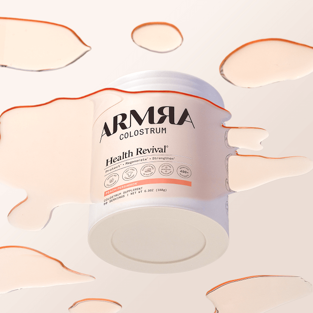 A jar of ARMRA colostrum peach persimmon