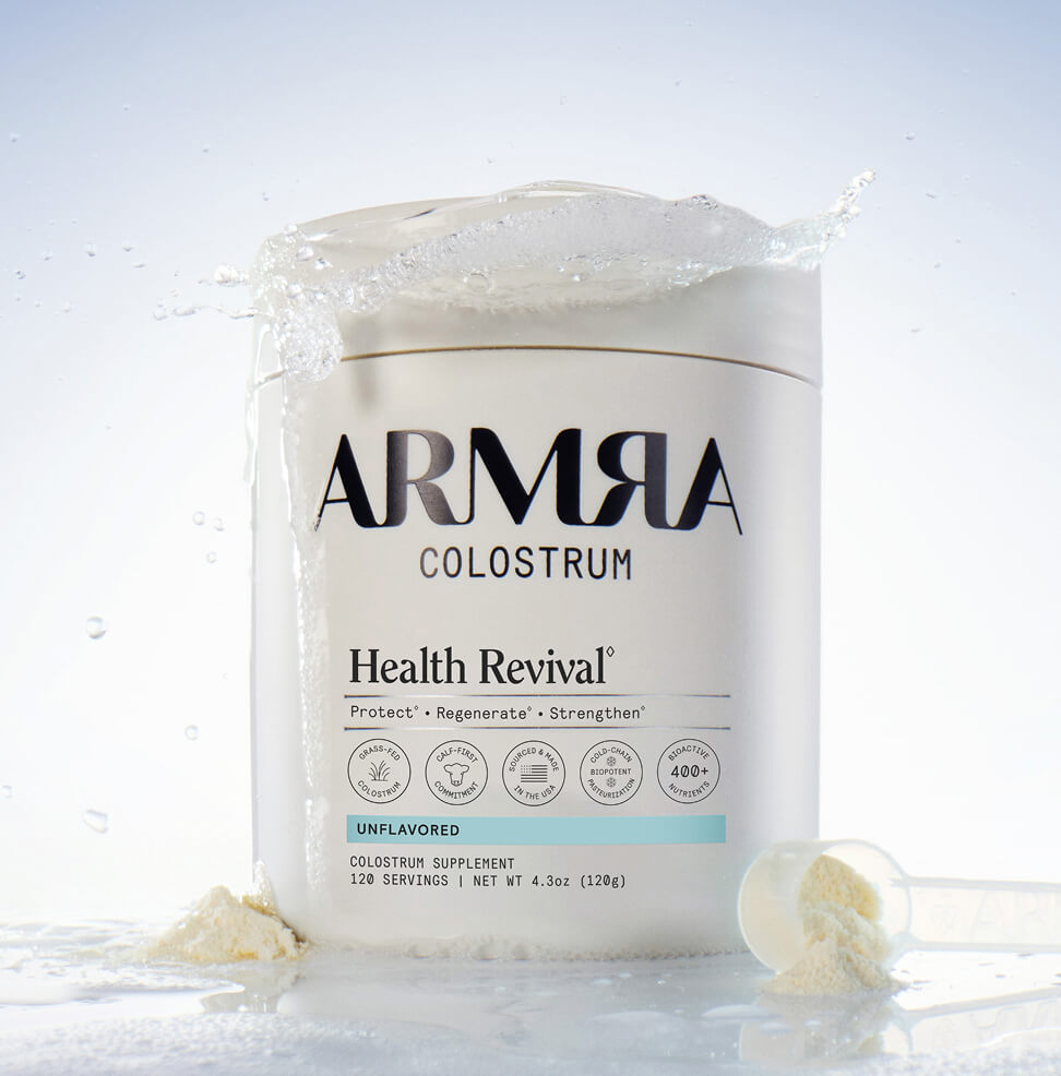 ARMRA Colostrum supplement container on a light gray background