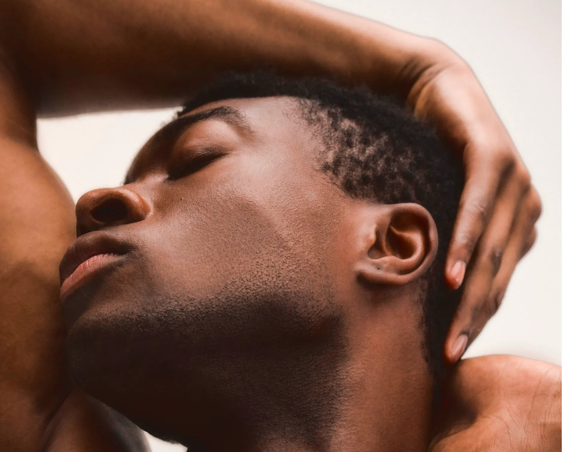 Man holding head